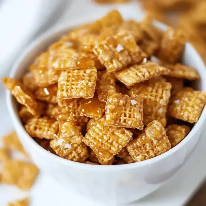 Crunchy golden cereal squares coated in shiny caramel and sprinkled with sea salt.